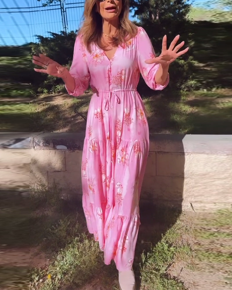 Lang lyserød kjole med tilspidset talje