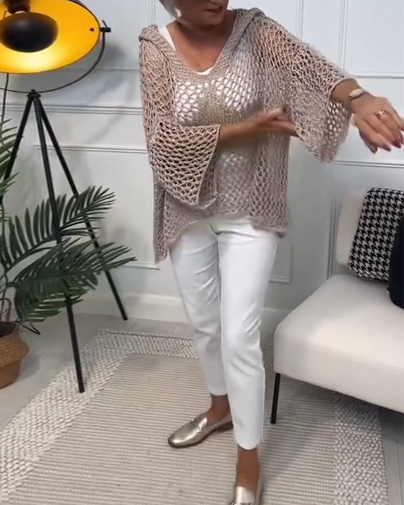 Ensfarvet hullet sweater i løs pasform