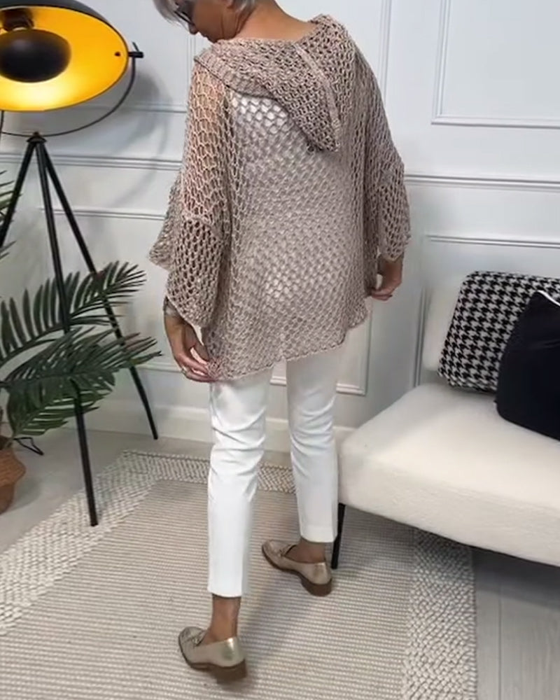 Ensfarvet hullet sweater i løs pasform