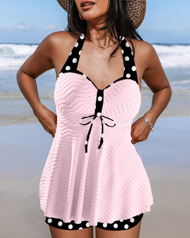 Ribbet tankini med polkaprikker