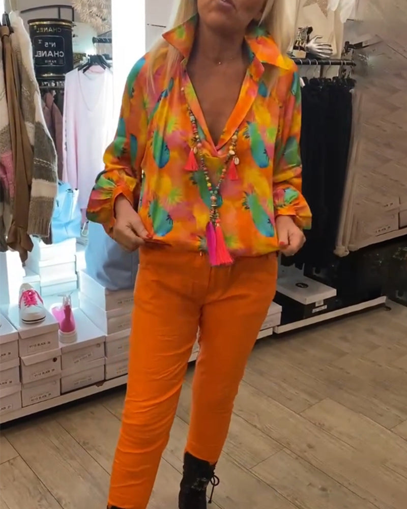 Orange bluse med reverskrave