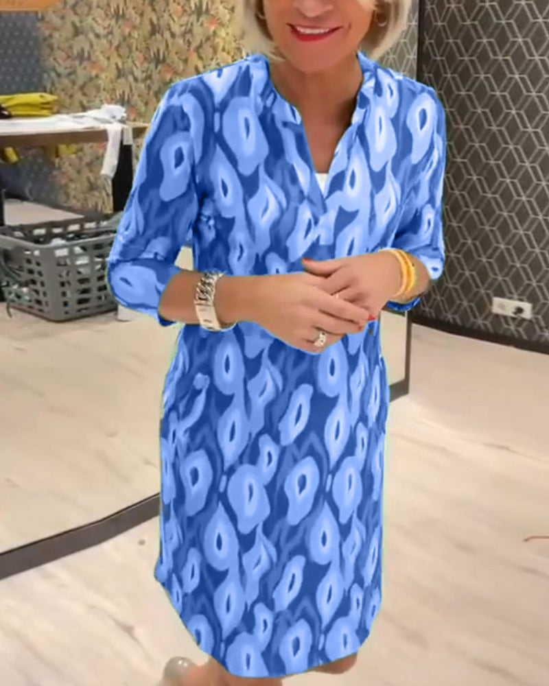 grøn kjole med print og trekvarte ærmer