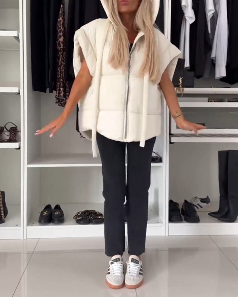 Vatteret vest med hætte og lynlås