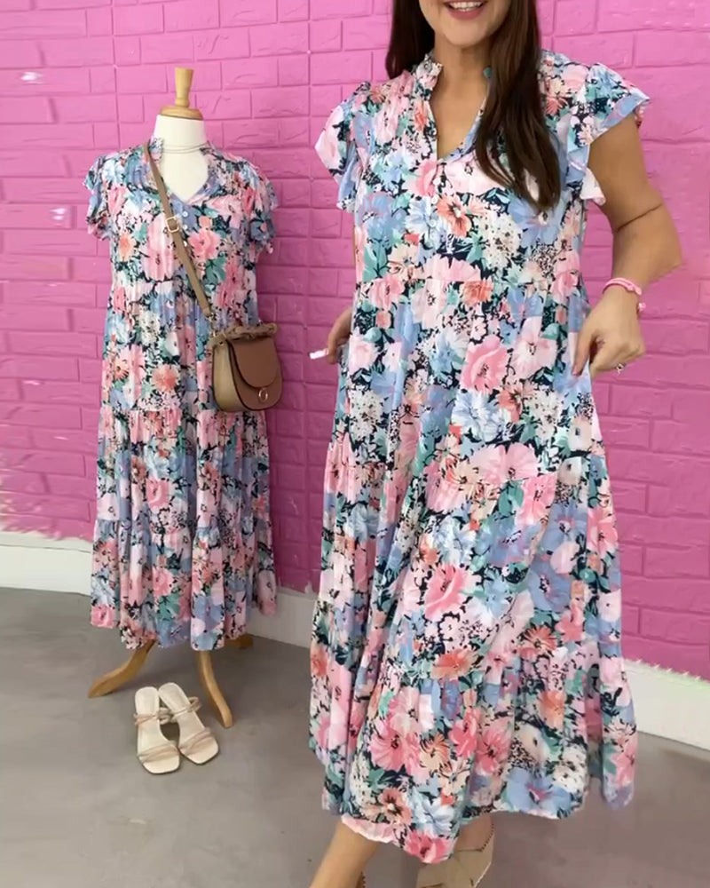Blomsterkjole med V-hals i afslappet stil