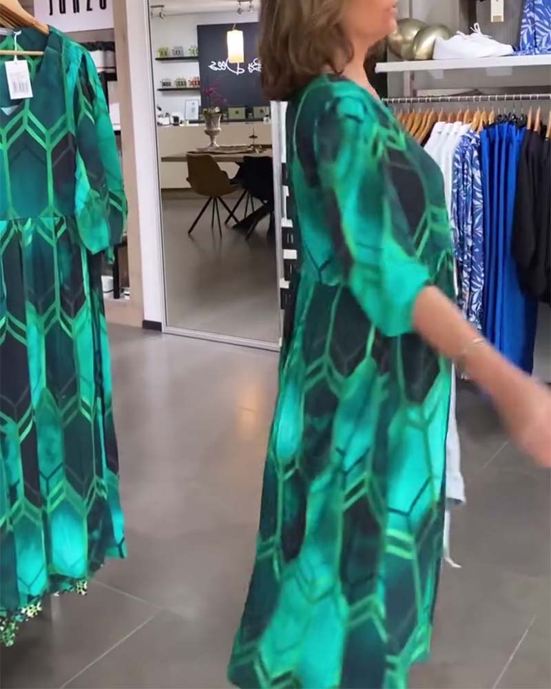 Grøn kjole med print og V-udskæring