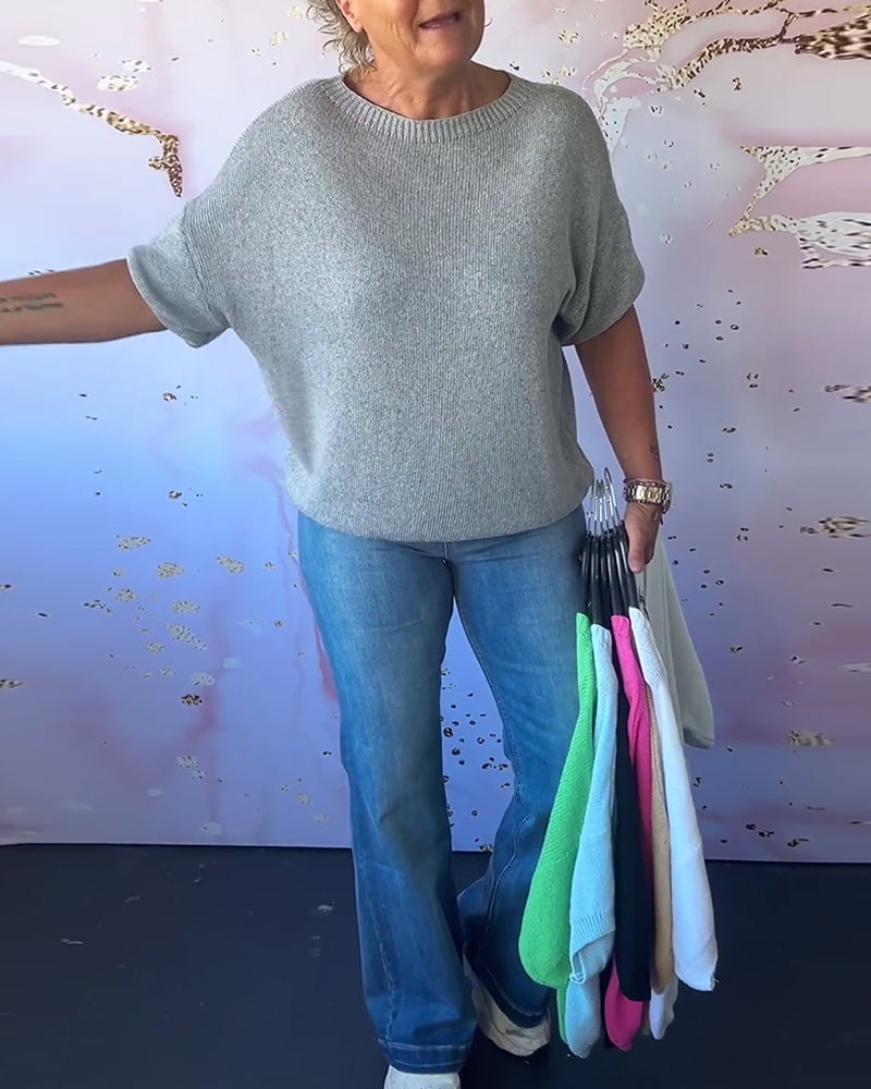 Løs ensfarvet pullover med rund hals