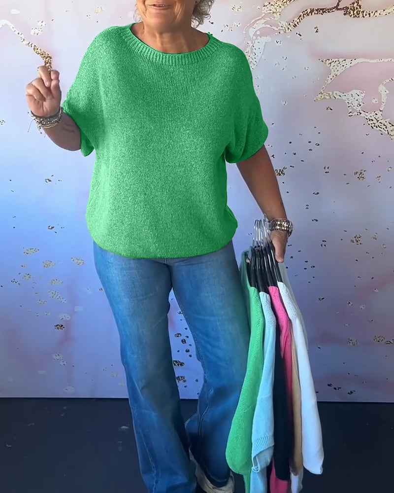 Løs ensfarvet pullover med rund hals