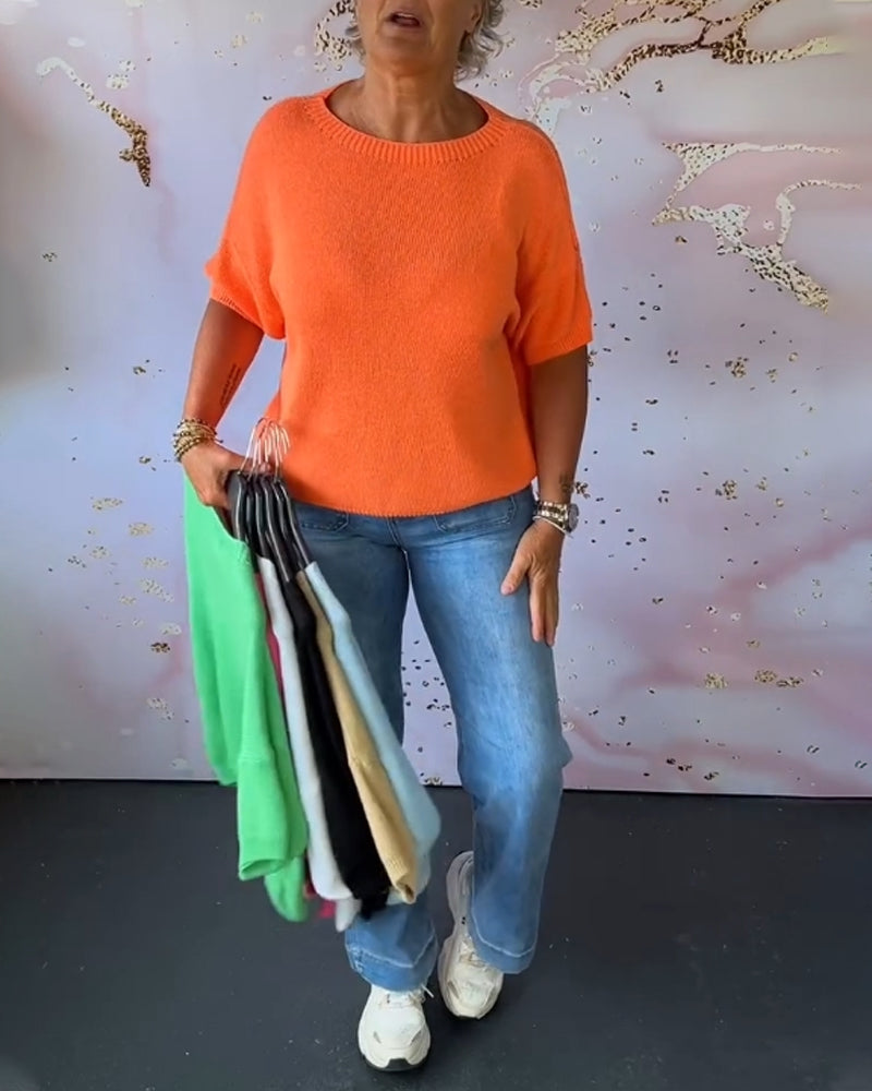 Løs ensfarvet pullover med rund hals