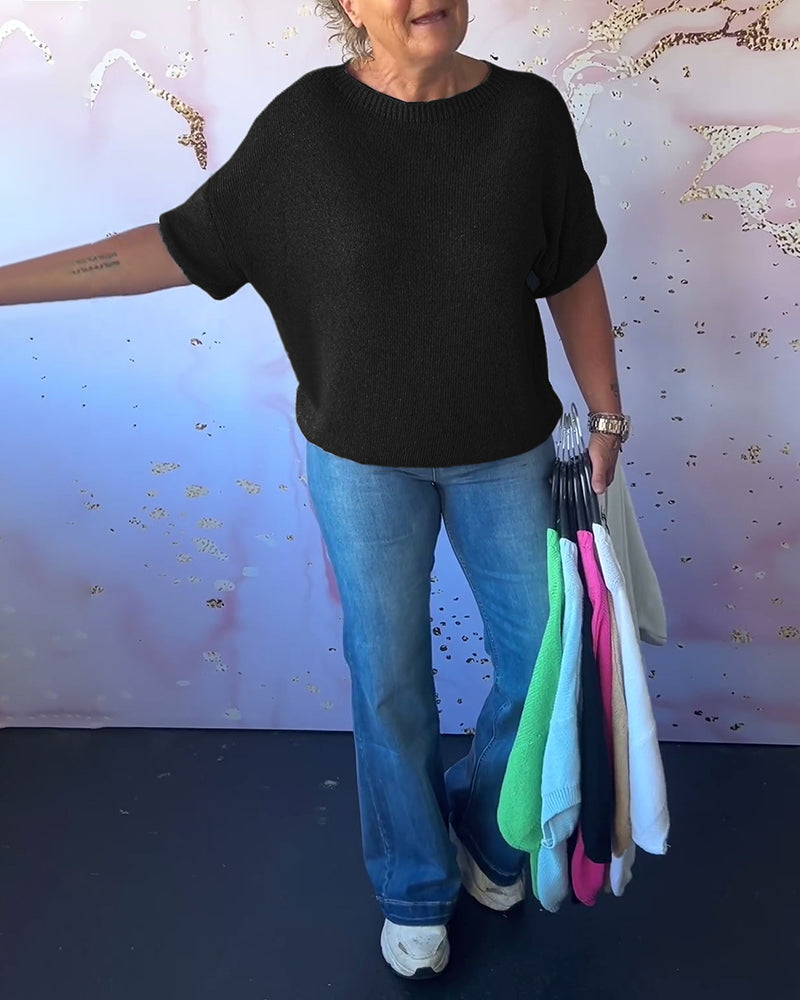 Løs ensfarvet pullover med rund hals