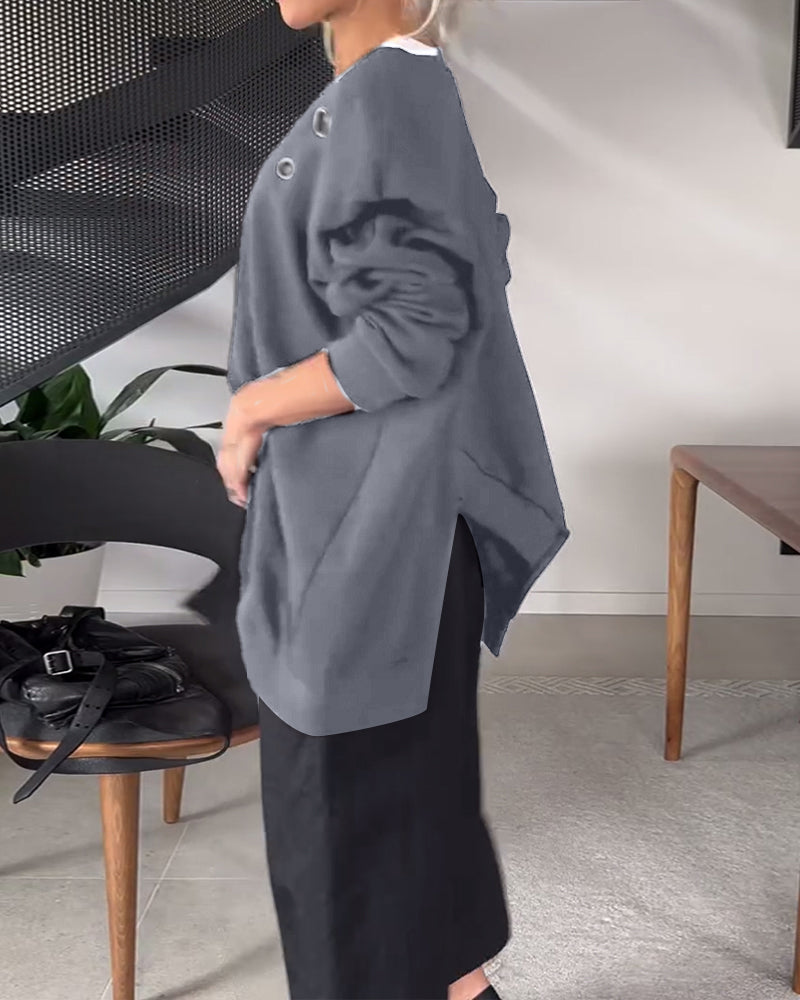 Sort sweater i løs pasform med slids