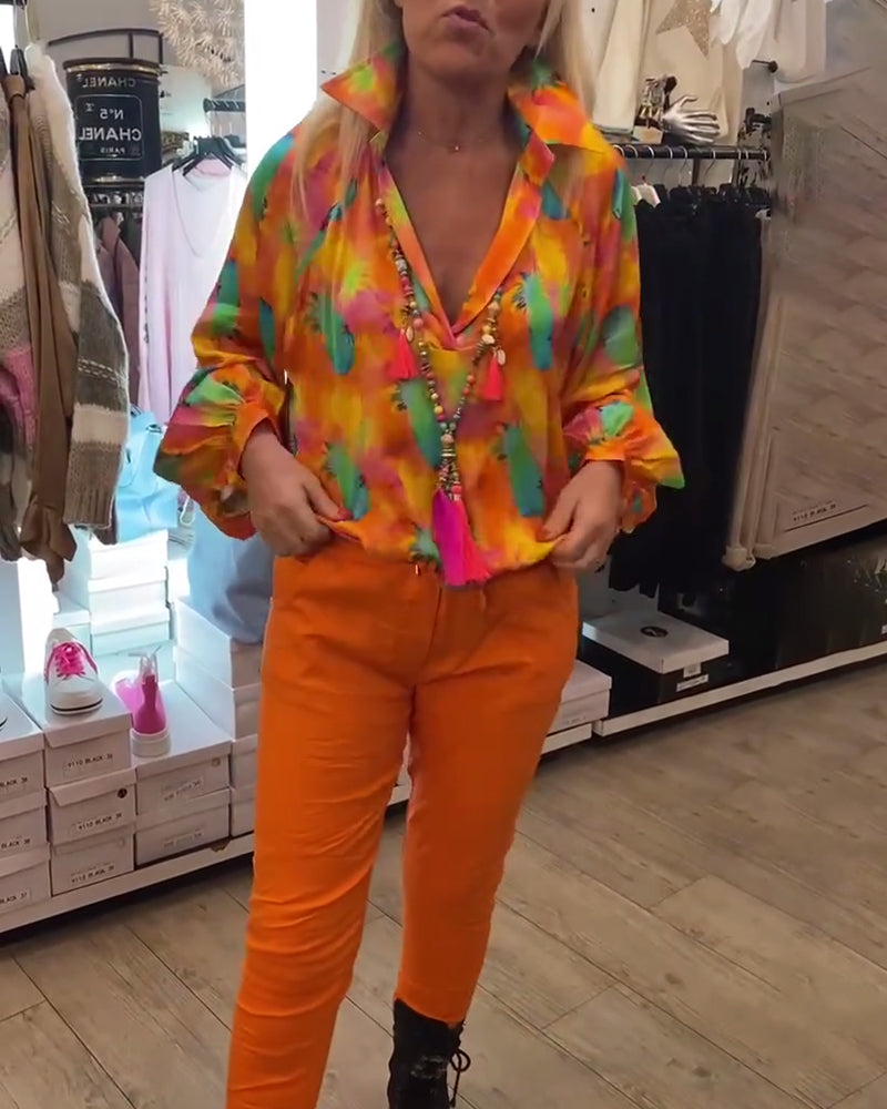 Orange bluse med reverskrave