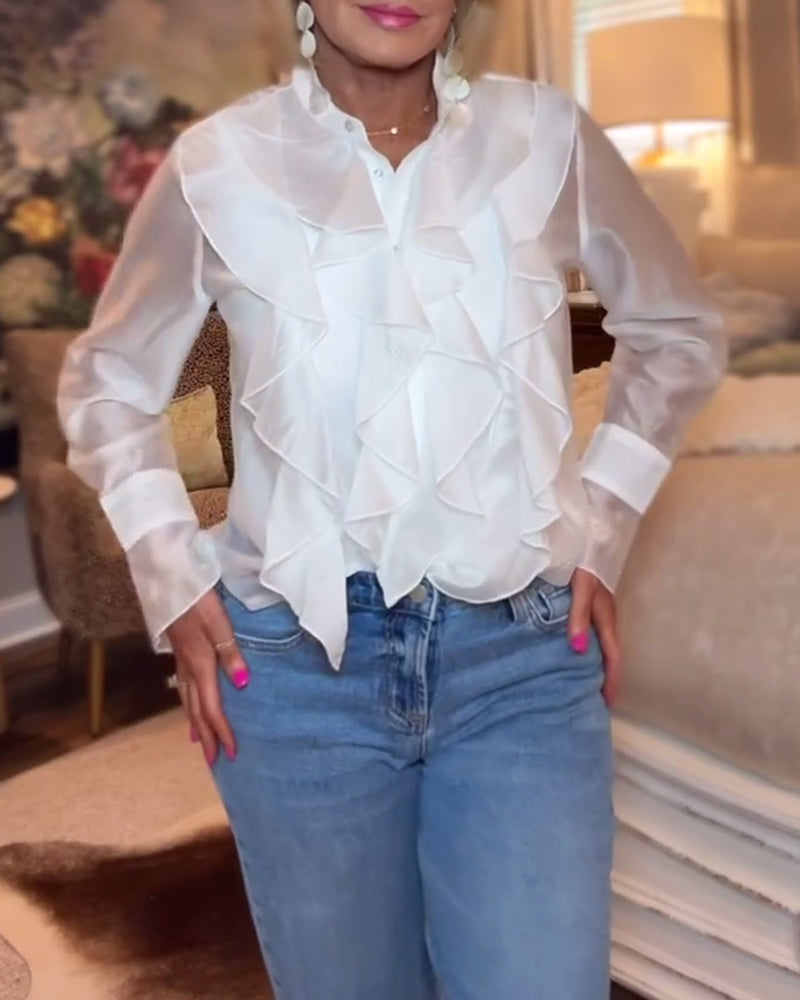 Elegant bluse med ensfarvet flæse