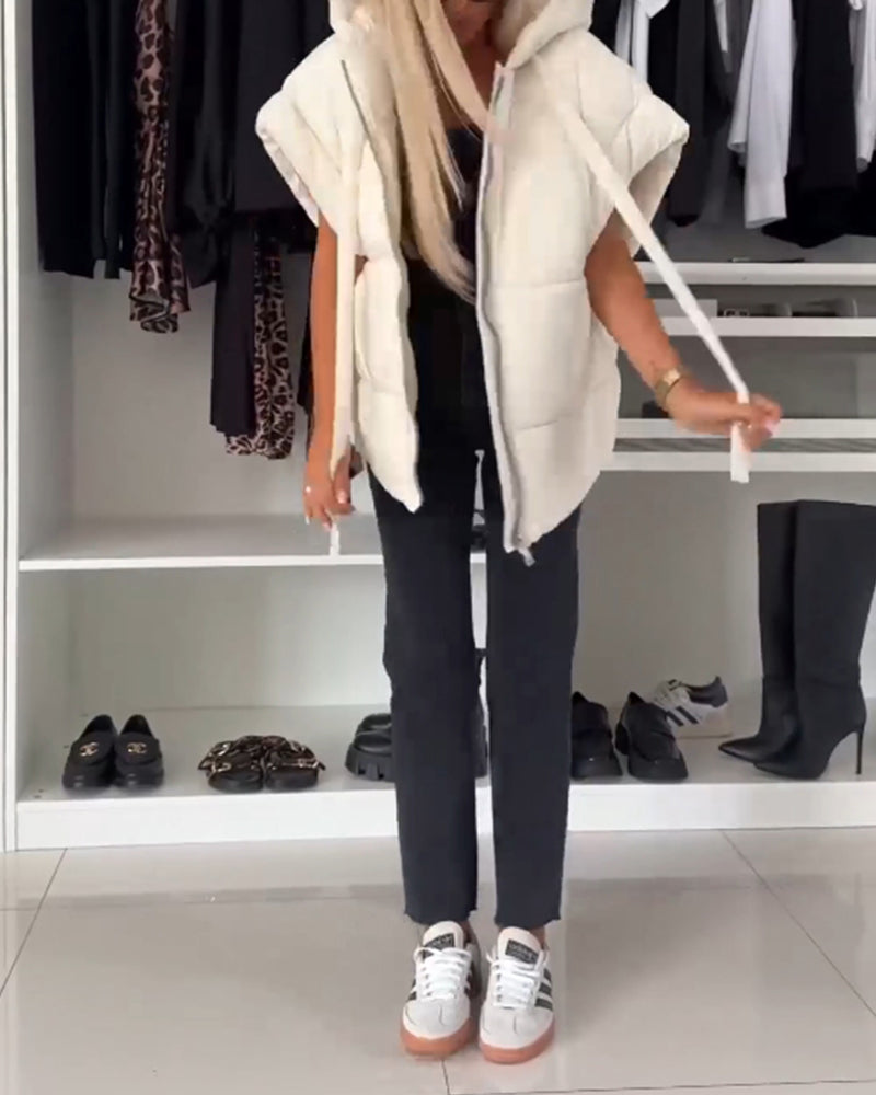 Vatteret vest med hætte og lynlås