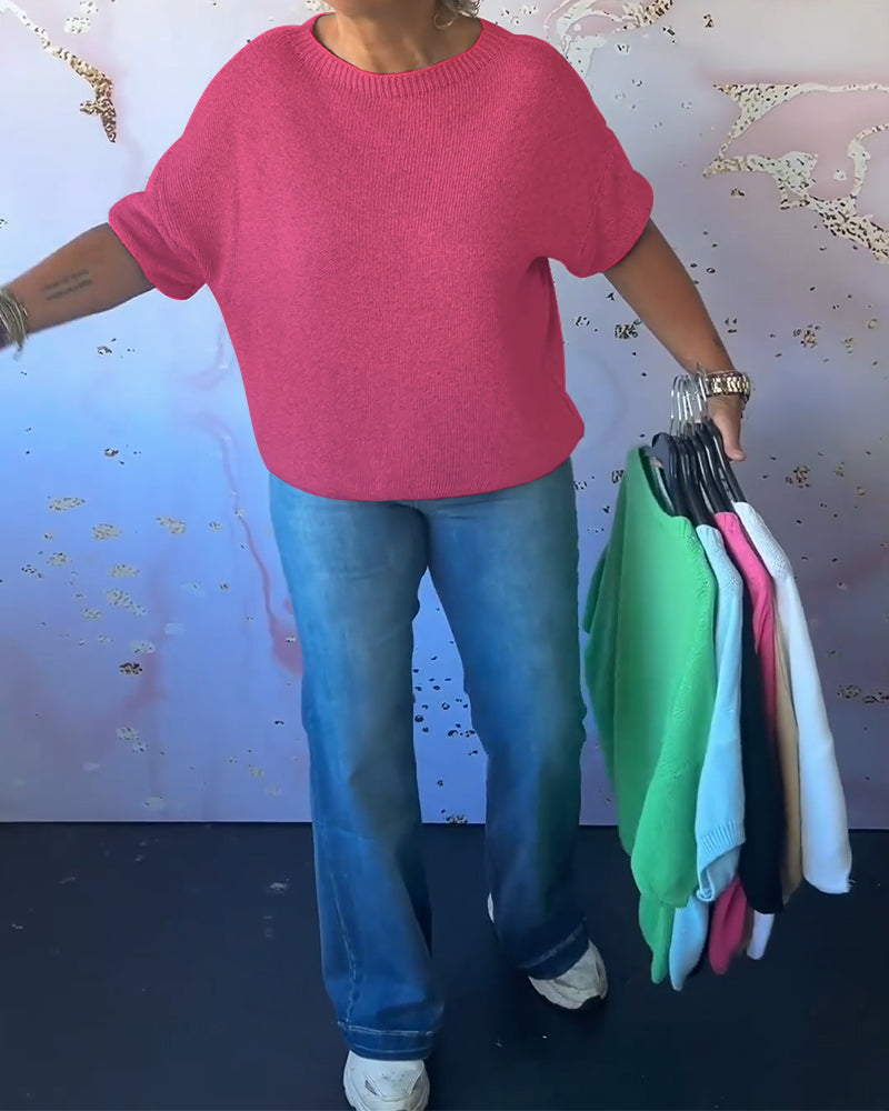 Løs ensfarvet pullover med rund hals