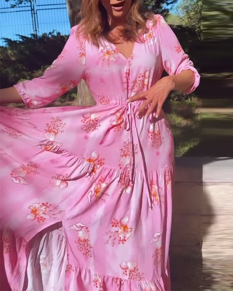 Lang lyserød kjole med tilspidset talje