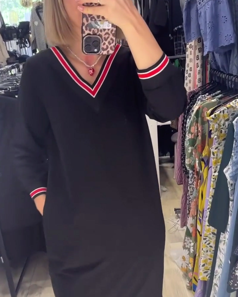 V-halset kjole med lommer