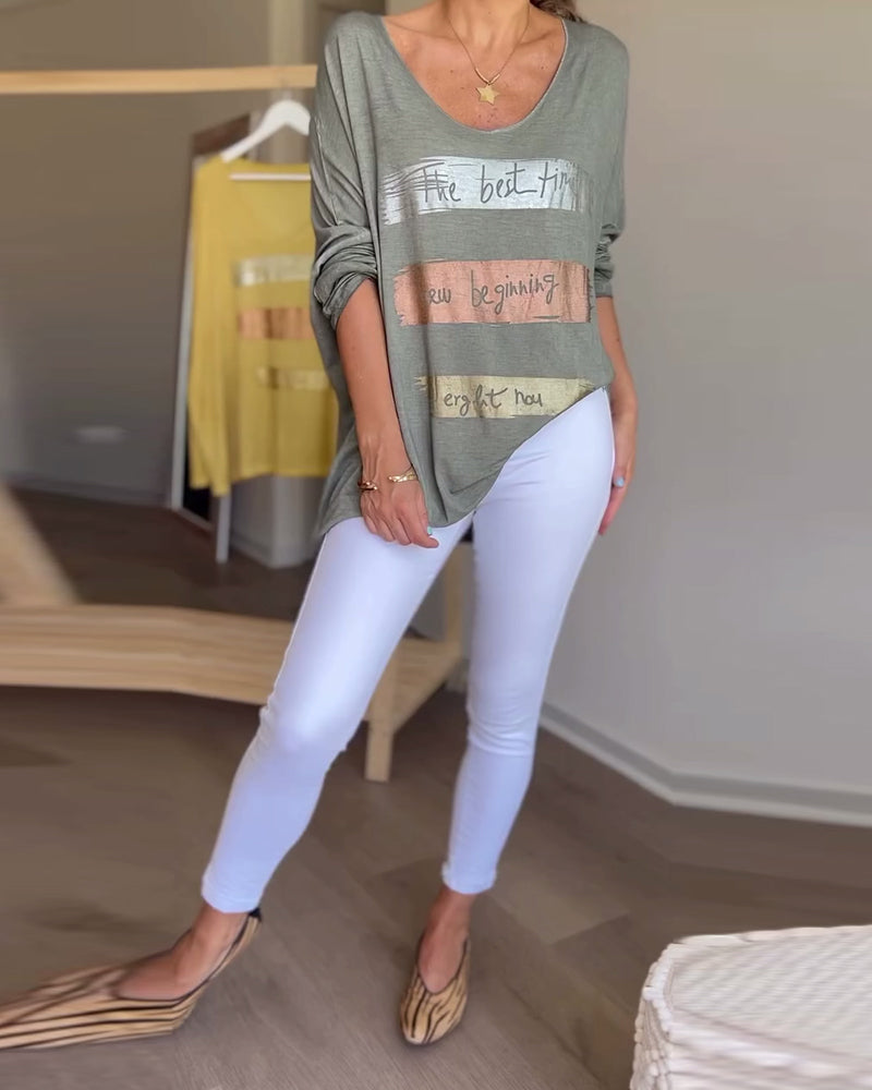 Langærmet top med rund hals og skriftmotiv