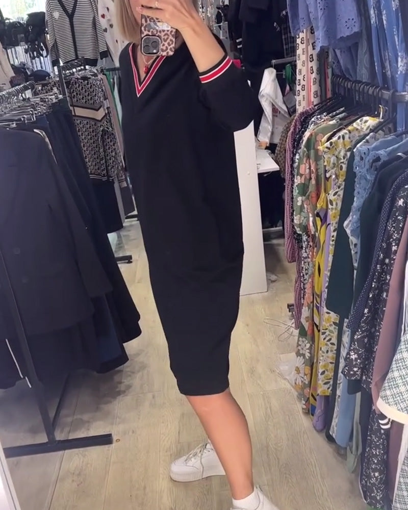 V-halset kjole med lommer