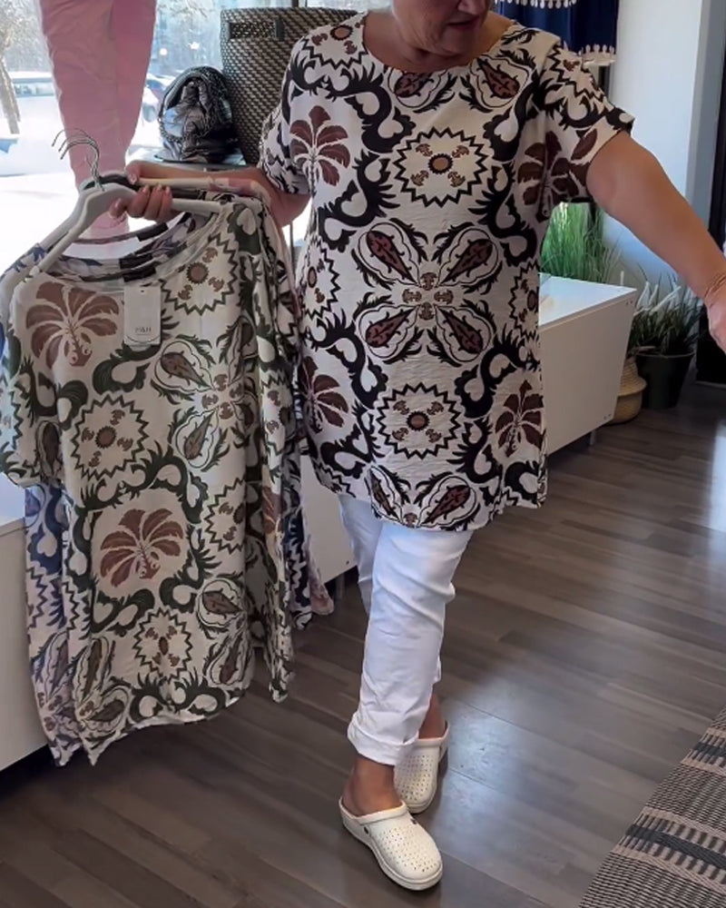 Afslappet blomsterbluse med rund hals