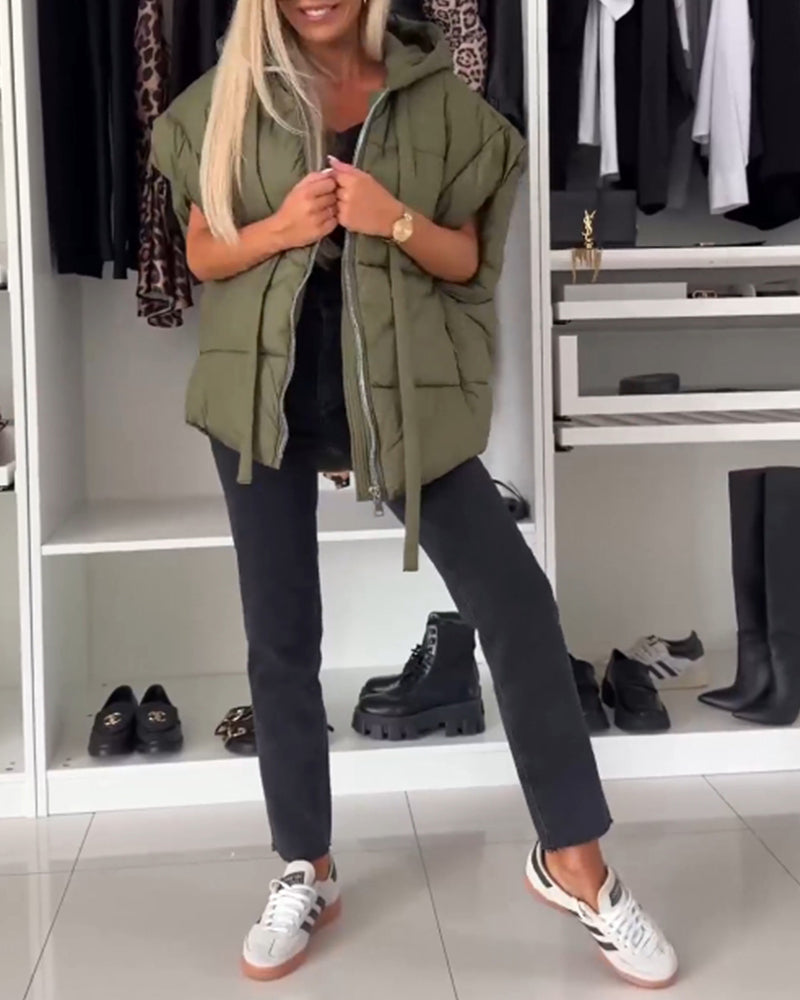 Vatteret vest med hætte og lynlås