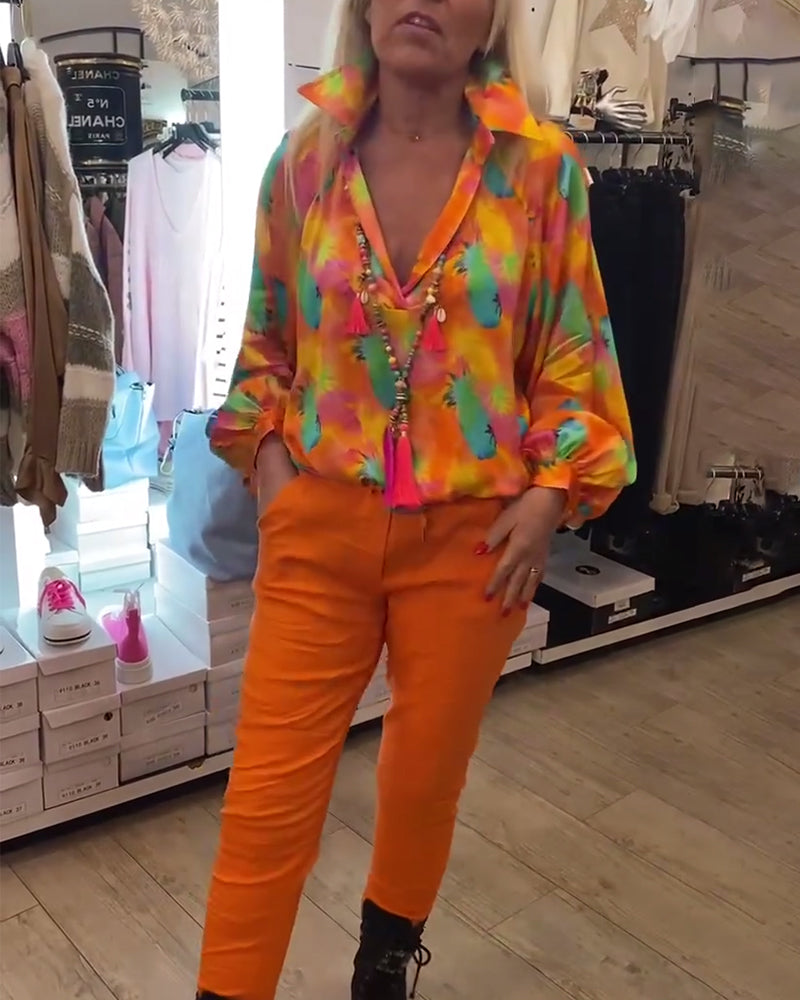 Orange bluse med reverskrave