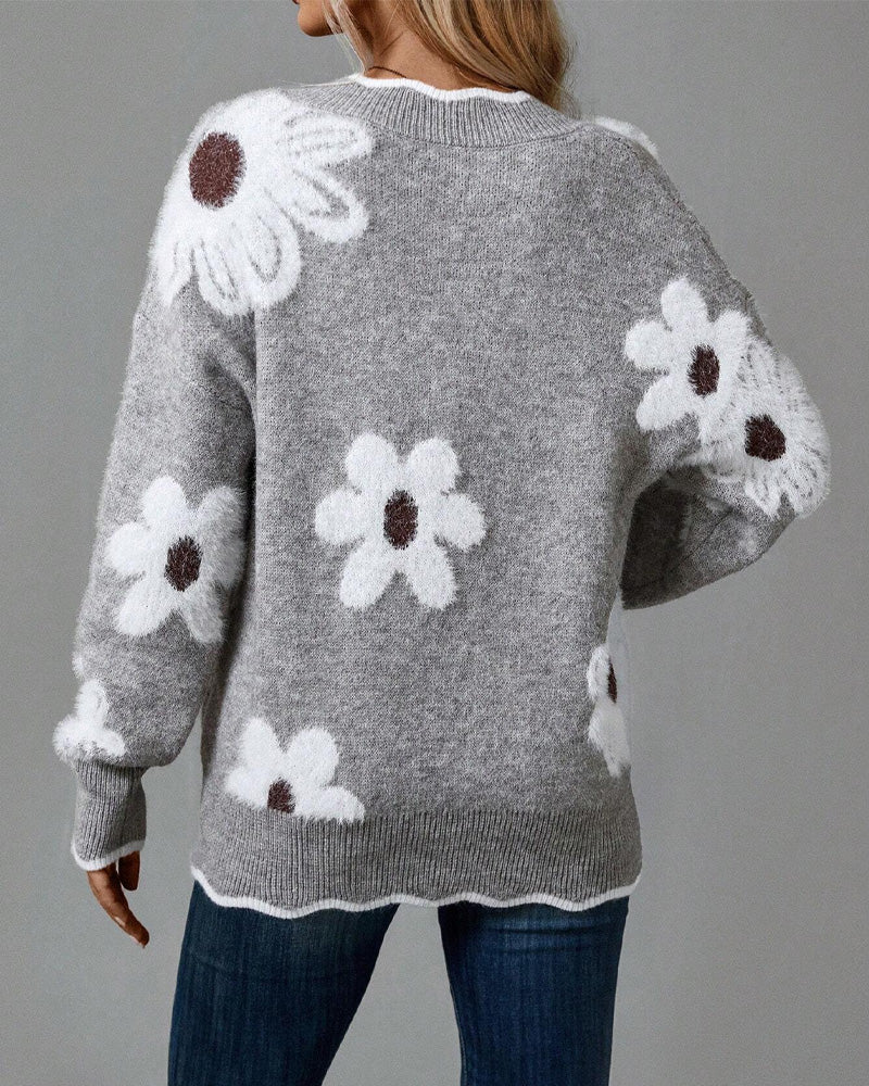 V-halset pullover med blomstermotiv