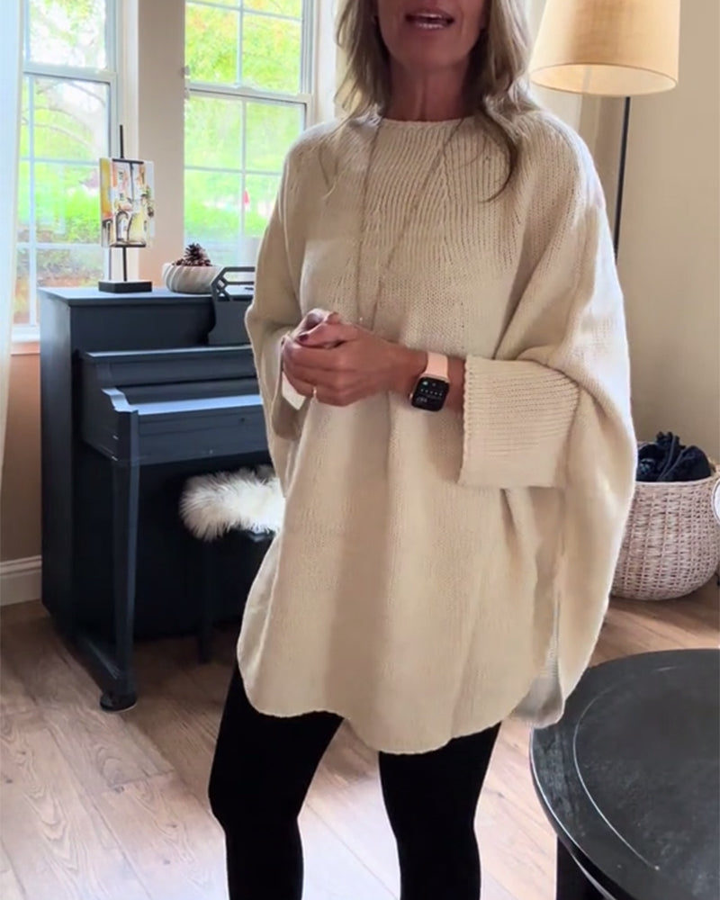 Stilfuld rød sweater i løs pasform med flagermusærmer