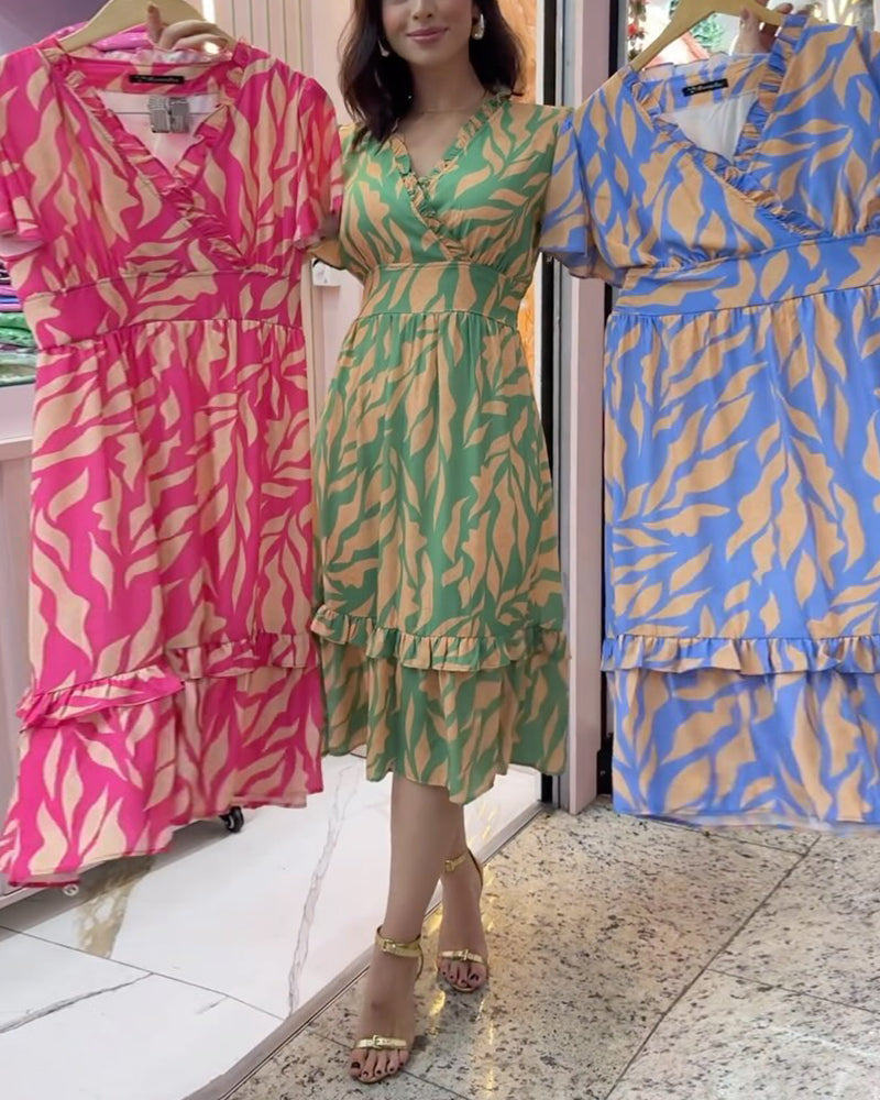 Elegant kjole med print og indsnævret talje