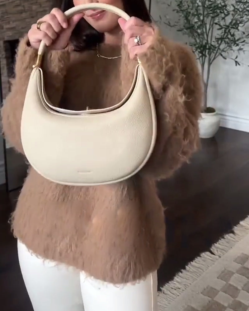 Ensfarvet elegant halvmåneformet skuldertaske