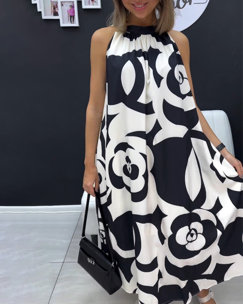 Sort-Hvid kjole med elegant designerprint