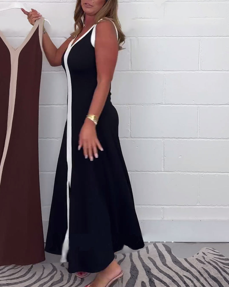 Kjole uden ærmer med hvide kanter og bred skillelinje