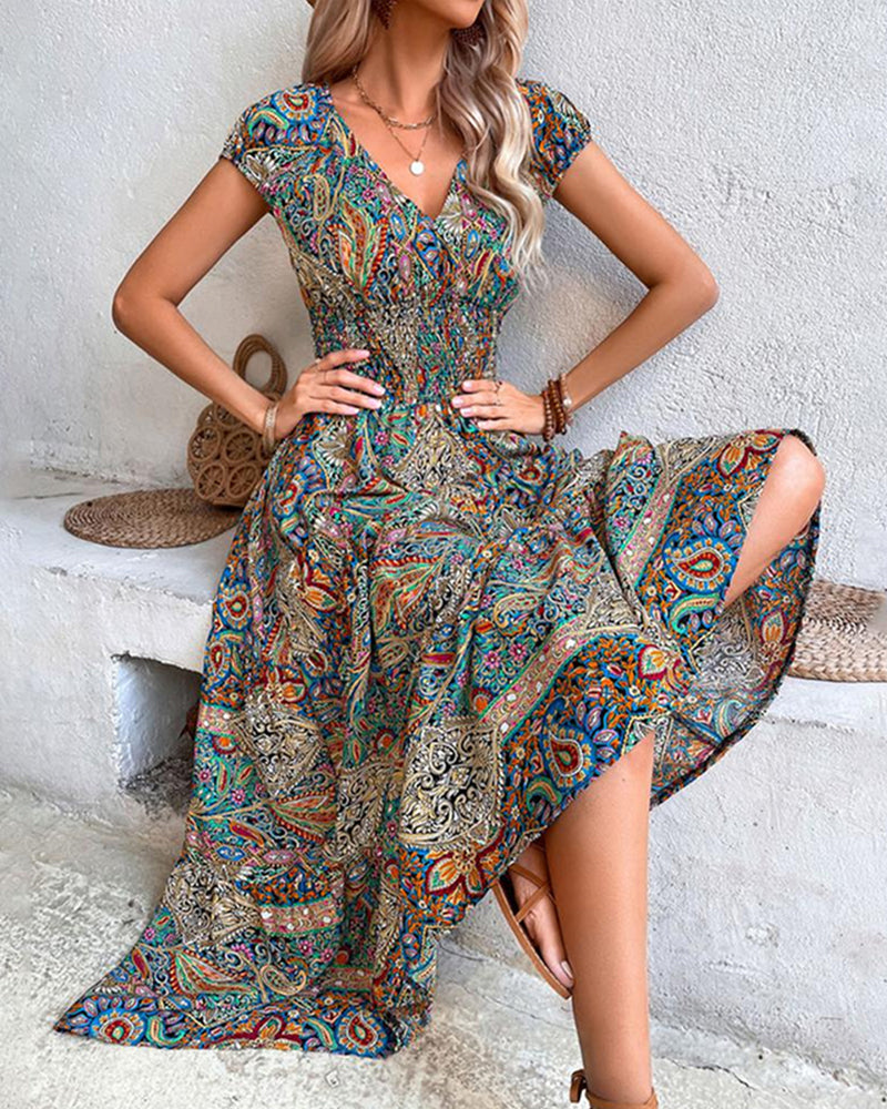 Elegant kjole med vintageprint