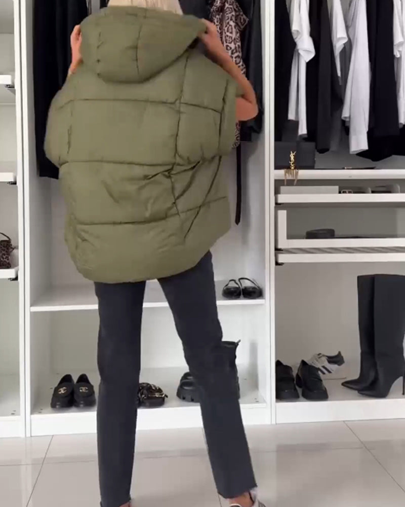 Vatteret vest med hætte og lynlås