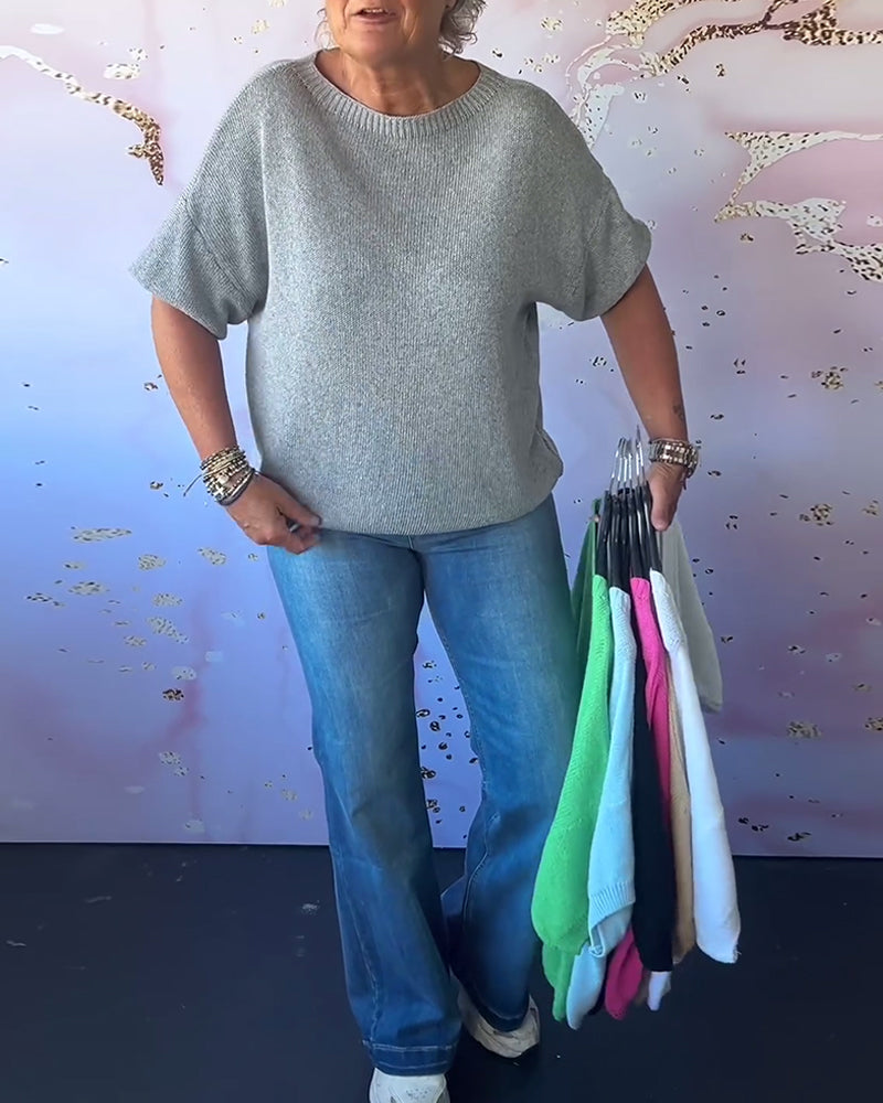 Løs ensfarvet pullover med rund hals