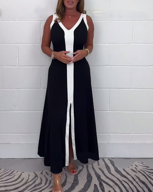 Kjole uden ærmer med hvide kanter og bred skillelinje