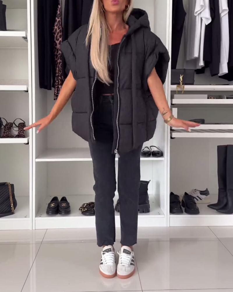 Vatteret vest med hætte og lynlås