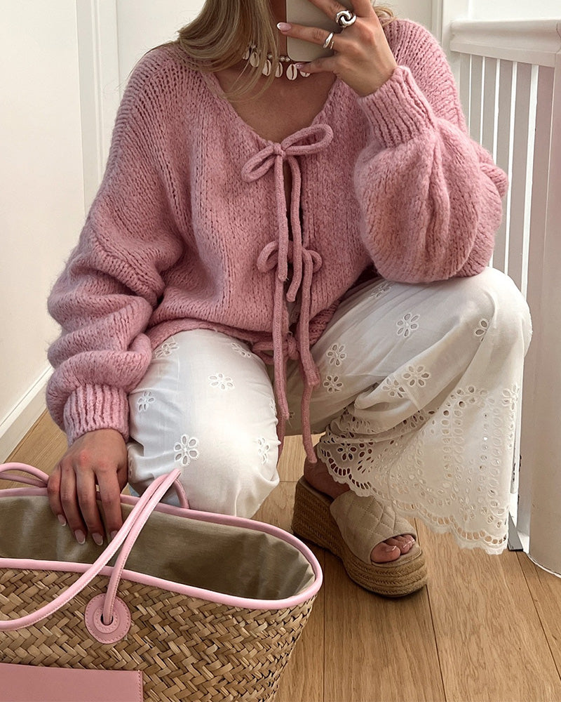 Striktrøje med snøresløjfer