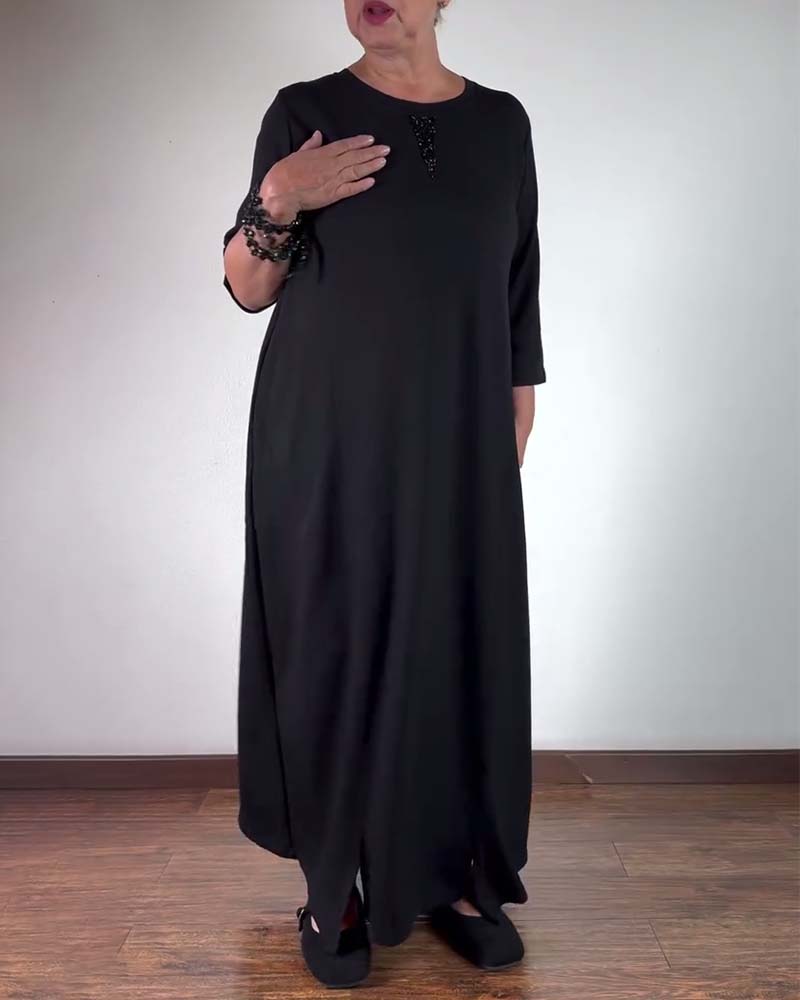 Sort løs kjole med rund hals