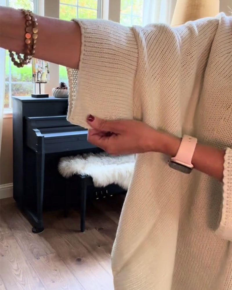 Stilfuld rød sweater i løs pasform med flagermusærmer