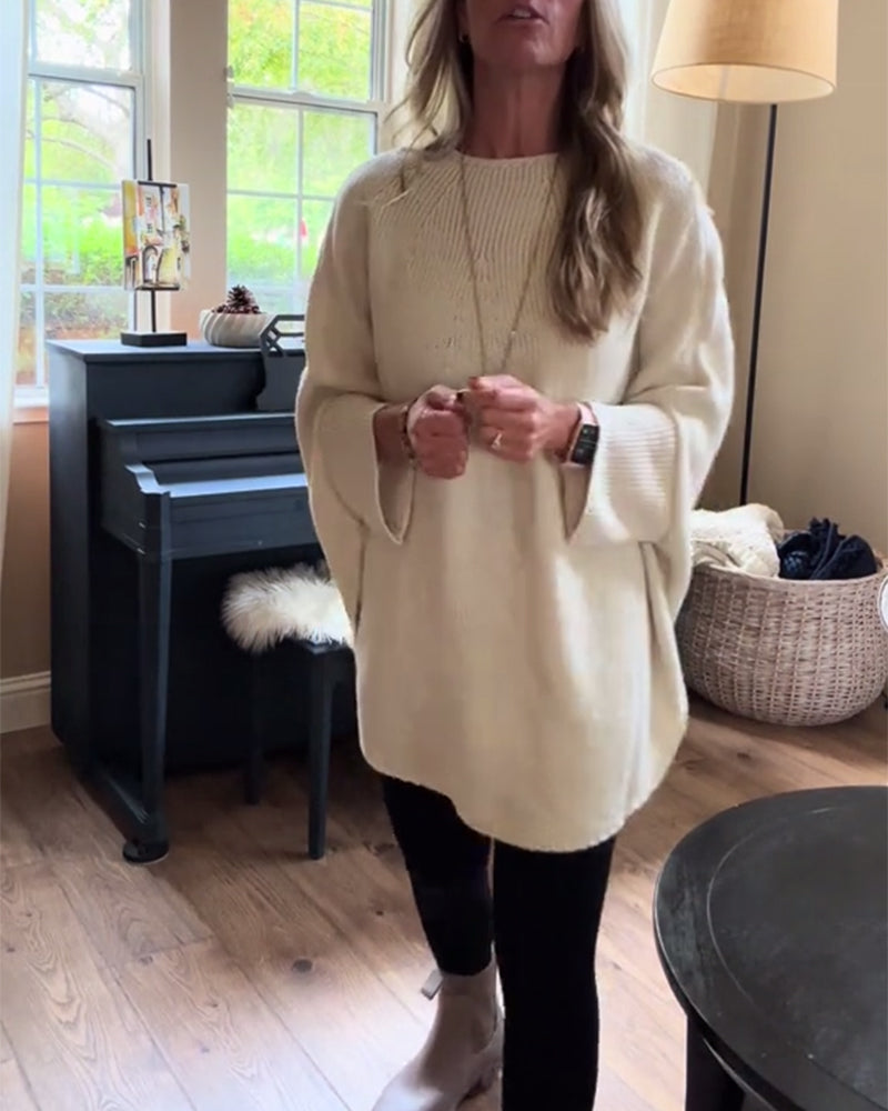 Stilfuld rød sweater i løs pasform med flagermusærmer