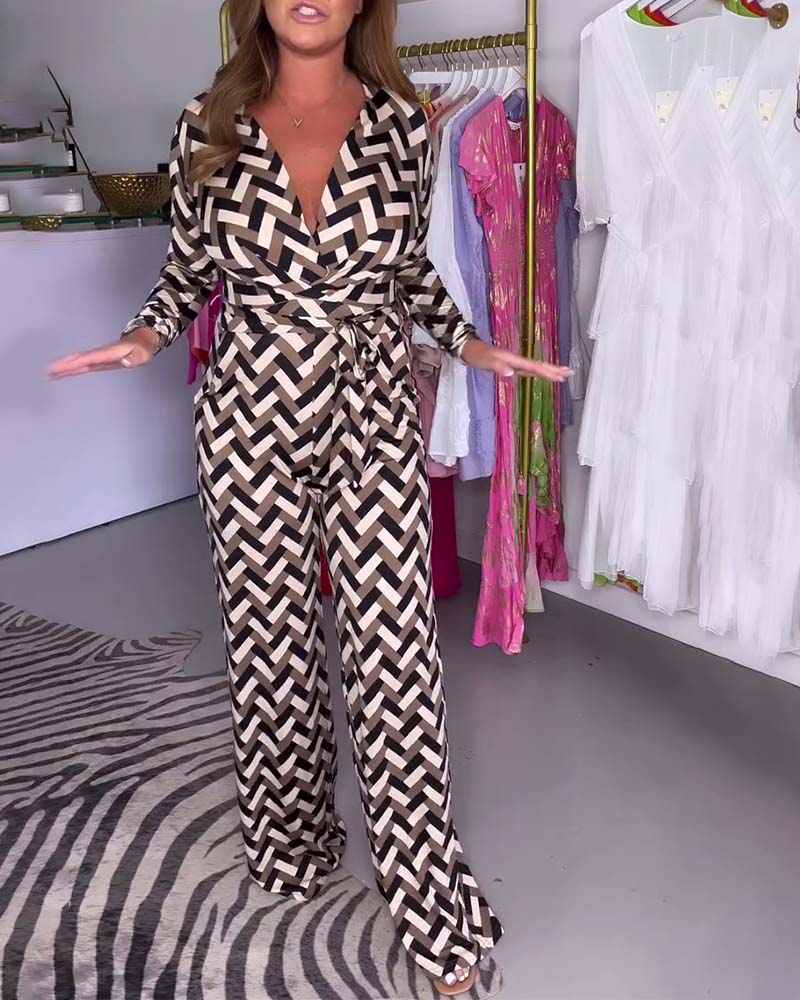 Stilfuldt jumpsuit med print og dyb V-udskæring