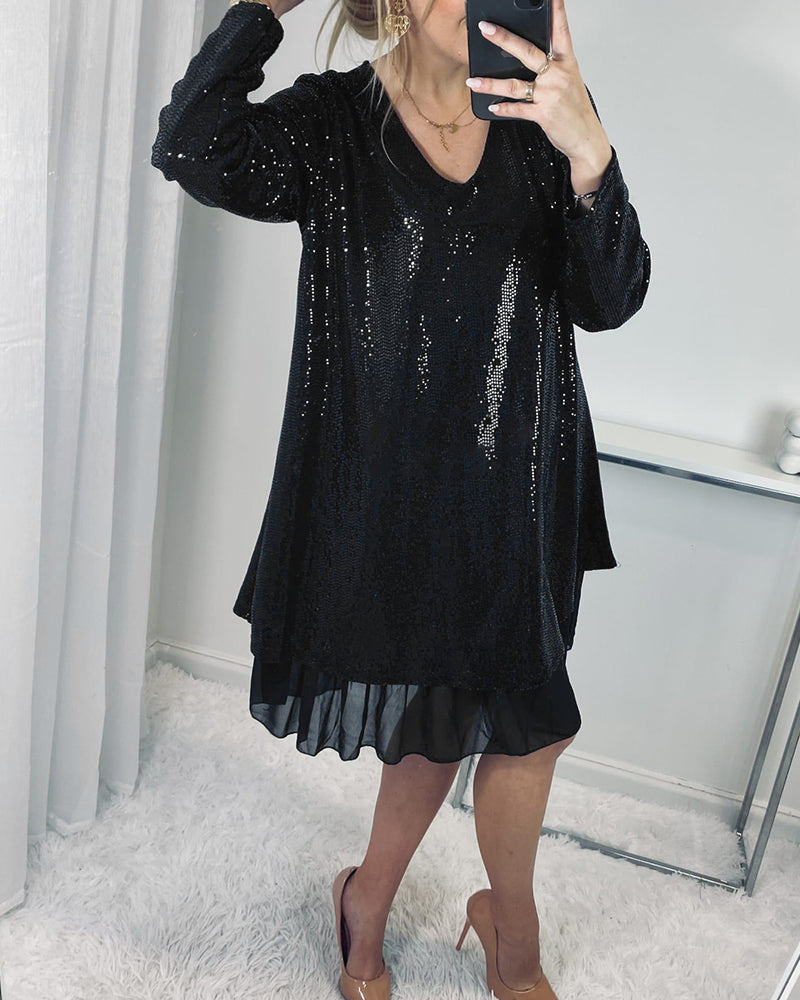 Elegant løs kjole med lange ærmer