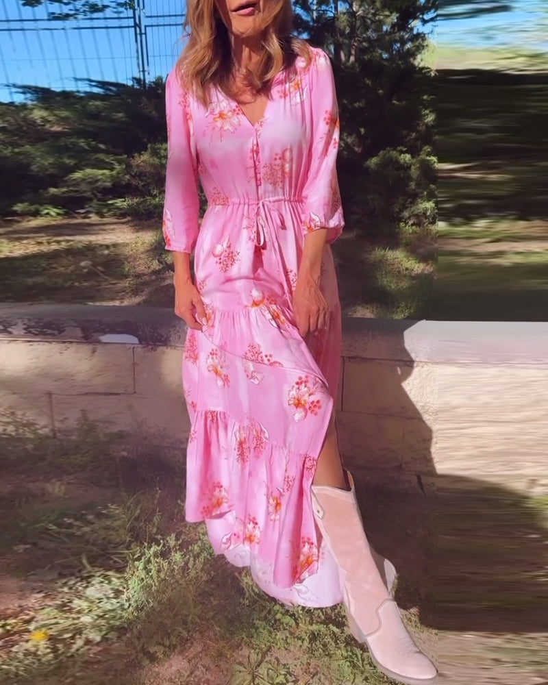 Lang lyserød kjole med tilspidset talje