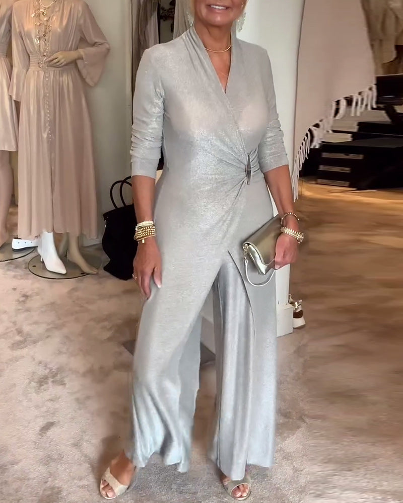 Elegant plisseret sølvfarvet jumpsuit