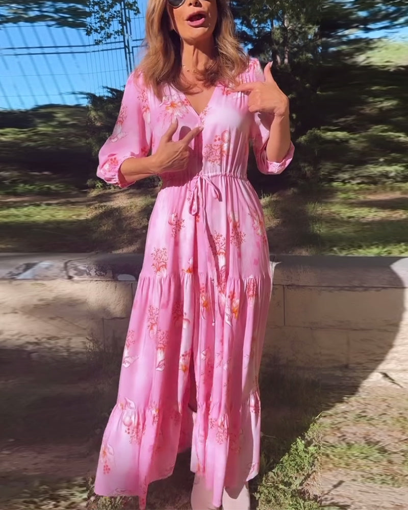 Lang lyserød kjole med tilspidset talje