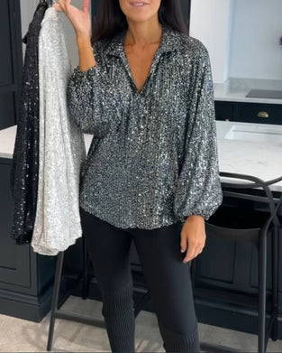 Ensfarvet bluse med pailletter