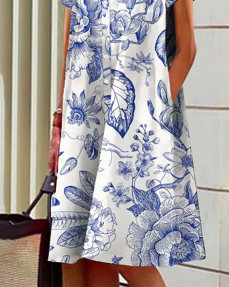 Afslappet elegant kjole med reverskrave og print