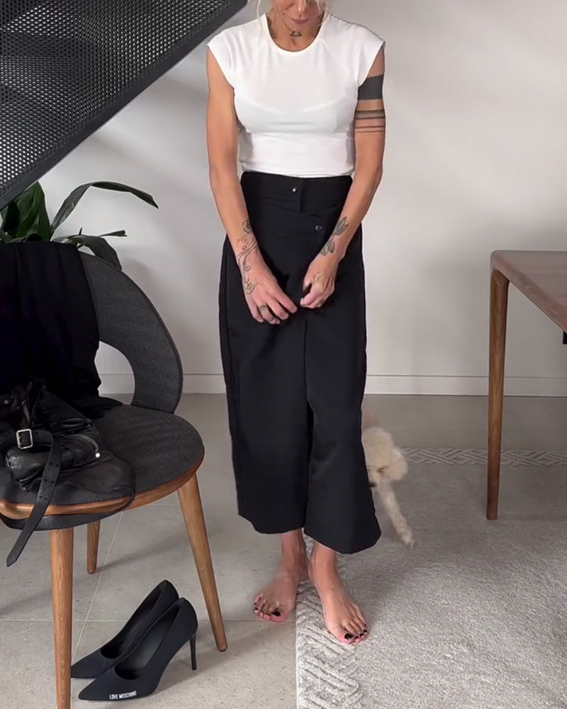 Højtaljede sorte bukser med tværgående lukning