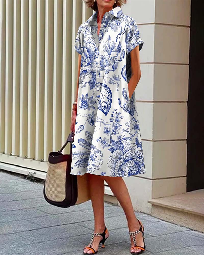 Afslappet elegant kjole med reverskrave og print