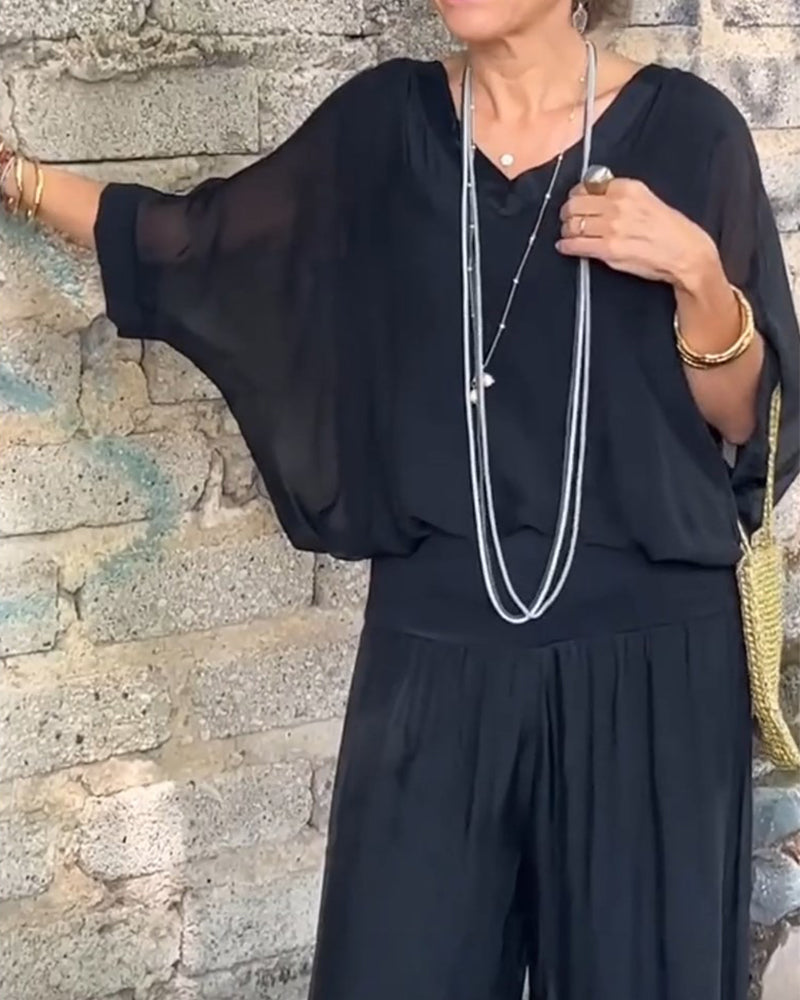 Ensfarvede bukser og bluse med V-udskæring | To-delt sæt